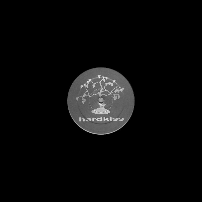 Back cover showing a plain black sleeve with a die cut hole to show the center label